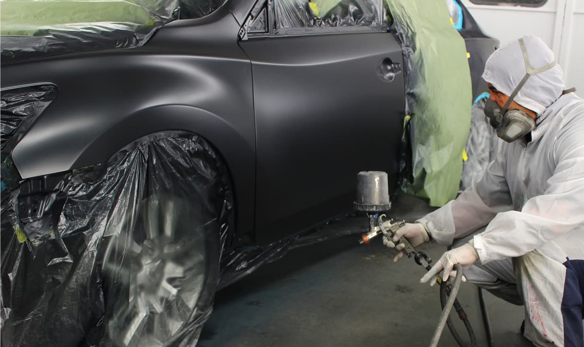 Happy's Collision Center auto body shop team